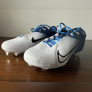 Nike White and Black Cleats with Blue Laces